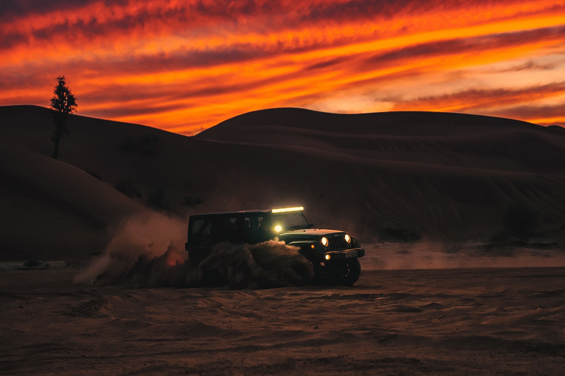Truck off-roading at sunset